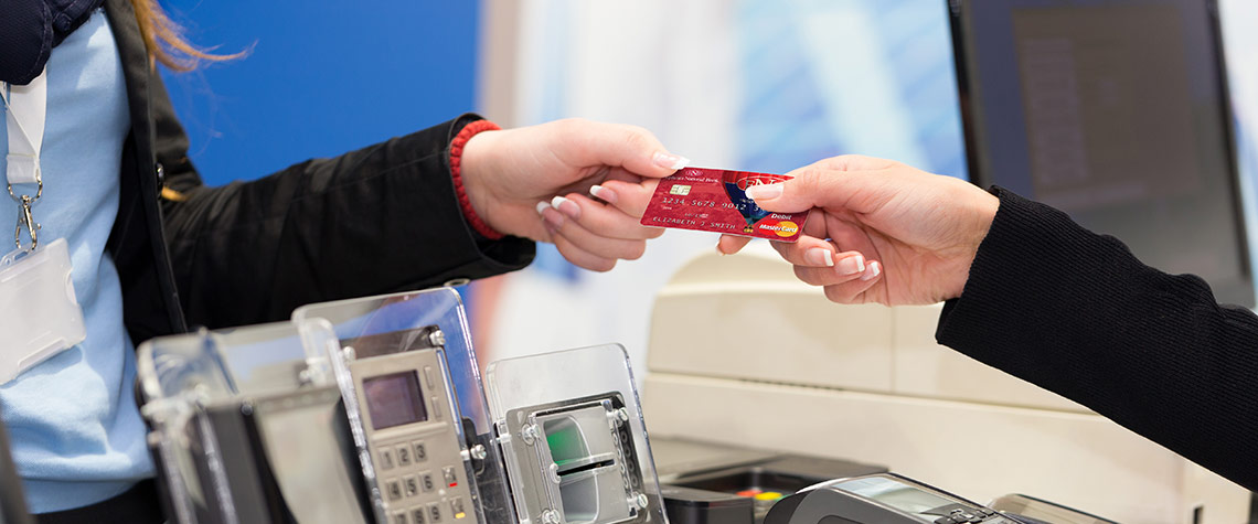 An Ephrata National Bank business customer uses her business debit card